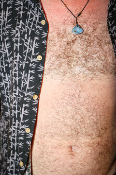 Close-up of a Man's Chest and Casual Shirt on Summer
