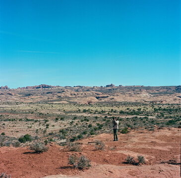 Photographer at La Sal Mountains Viewpoint in Arches
