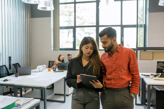 Multiracial group of people working at office.