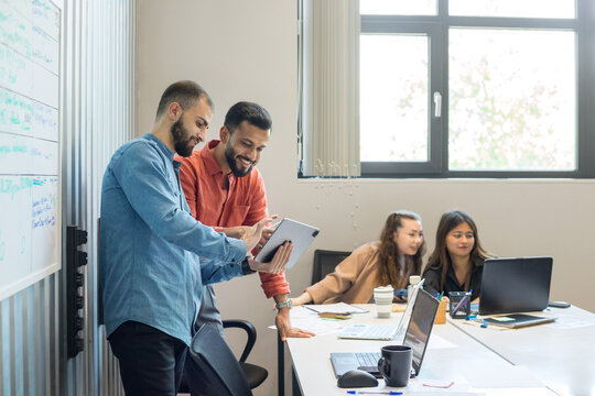 Multiracial group of people working at office.