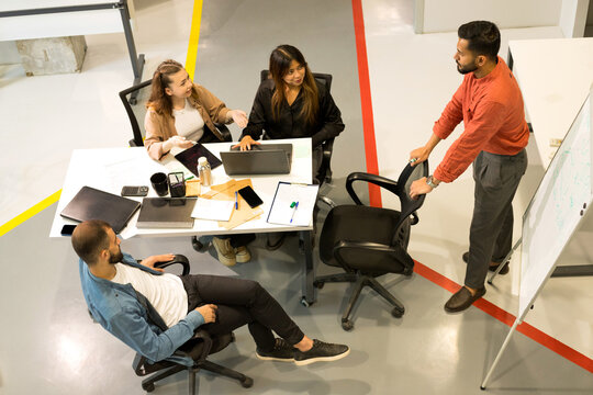 Multiracial group of people working at office.