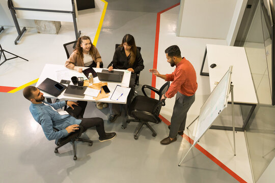 Multiracial group of people working at office.