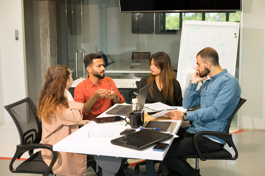 Multiracial group of people working at office.