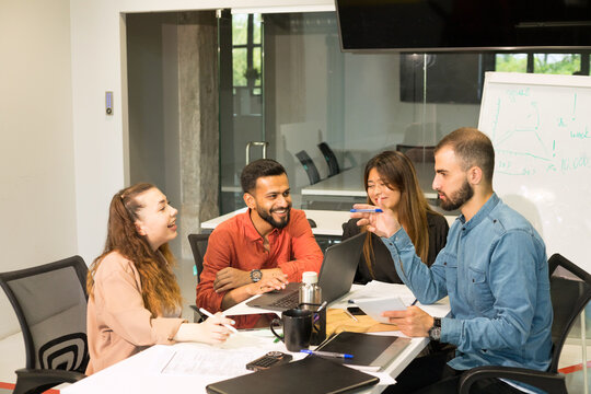 Multiracial group of people working at office.