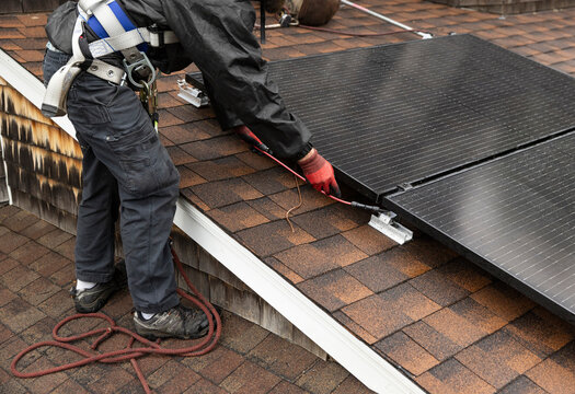 Solar Panel technician roof installation 