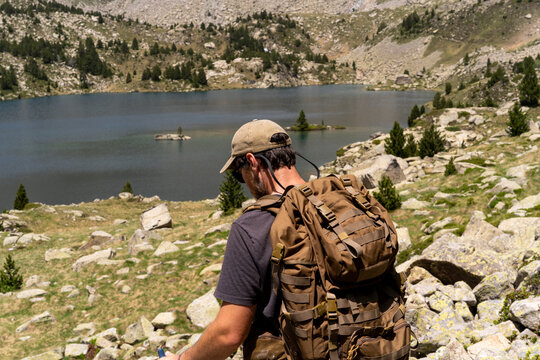 Hiker Alpine Lake