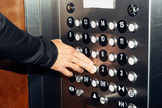 Pressing elevator button