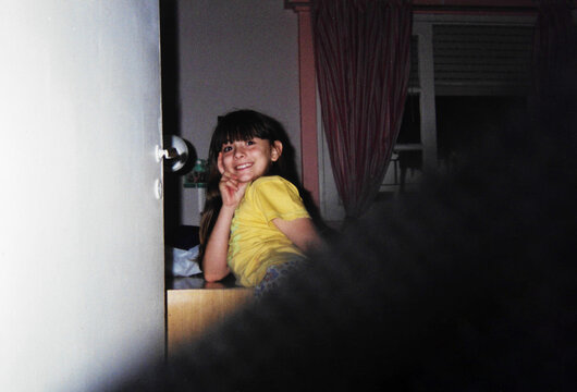 Smiling girl captured on 35mm film &ndash; 1990s