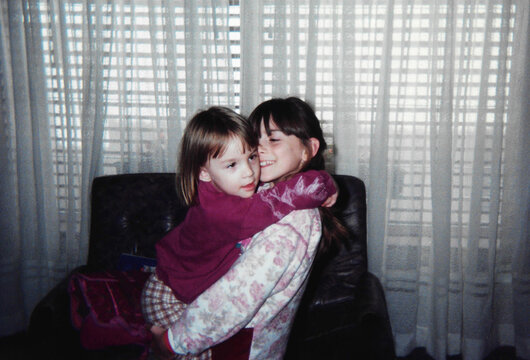 Emotional moment between two sisters captured on 90s film