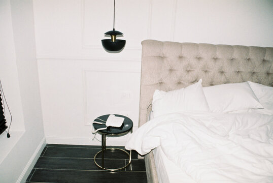 Cozy Bedroom with Soft Bedding and Modern Design
