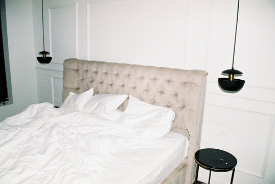 Cozy Bedroom with Soft Bedding and Modern Design
