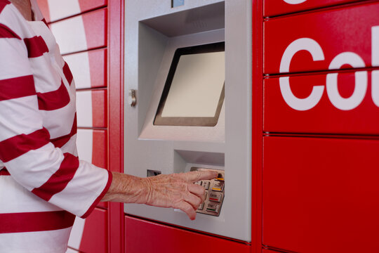 senior woman using digial keypad