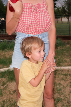 Son Holding Mom's Hand