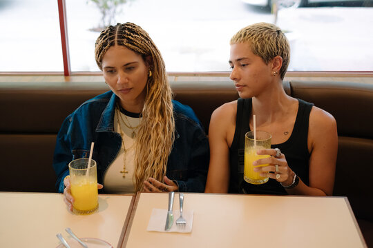 Tense Moment at a Caf&eacute; Table