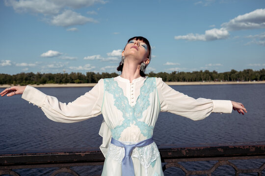 portrait of a woman by the river