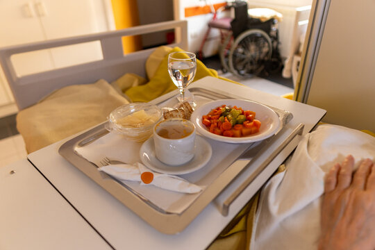 Hospital Meal Served on Tray With Fruit and Drink During Recovery