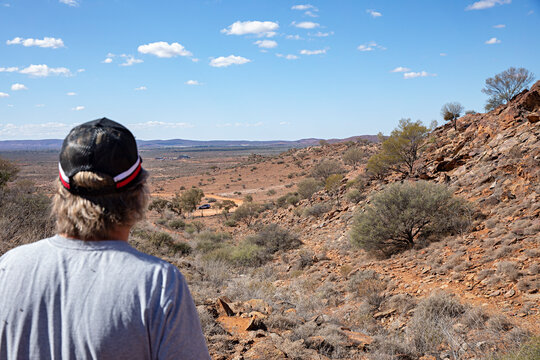 View of man's back in outback Australia looking at the view