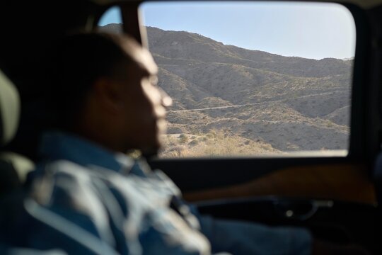 Mountain views from a car window during a road trip