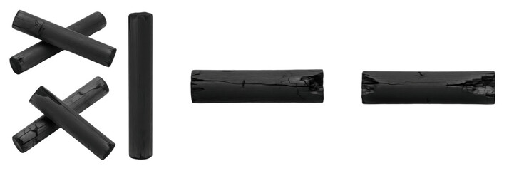 Set and collection of black charcoal sticks and graphite crayons in various positions and angles...