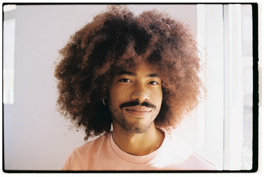 Bright Young Man With Curly Hair Portrait