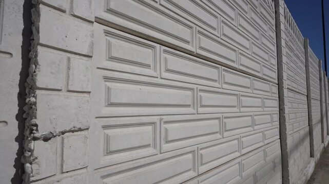 Decorative concrete panels that are created to fence their territory that look very beautiful