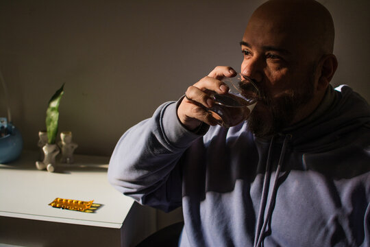 Man taking medication