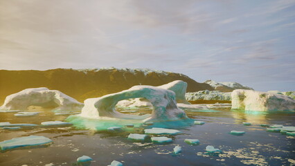 Icebergs float gracefully in calm waters, reflecting warm golden hues as the sun sets behind the mountains. Natures beauty is on full display in this tranquil arctic scene, captivating the viewer. © icetray