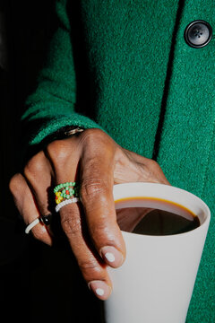 Close Up Stylish Young Man Holds Cup of Black Coffee