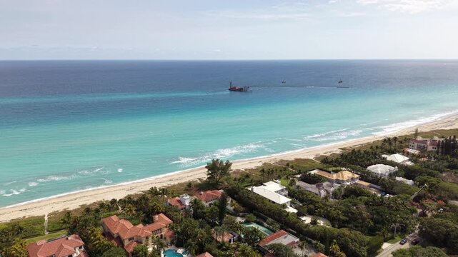 Dredge off shore Delray Beach widening project