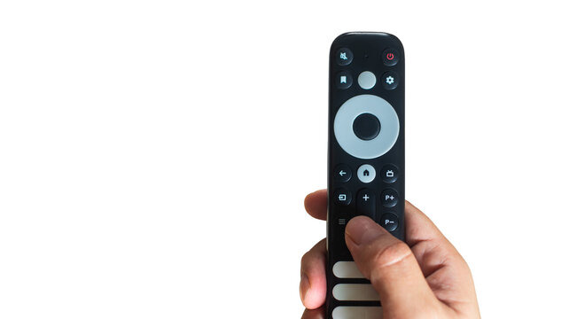 Hand holding smart TV remote control on white background for home automation concept