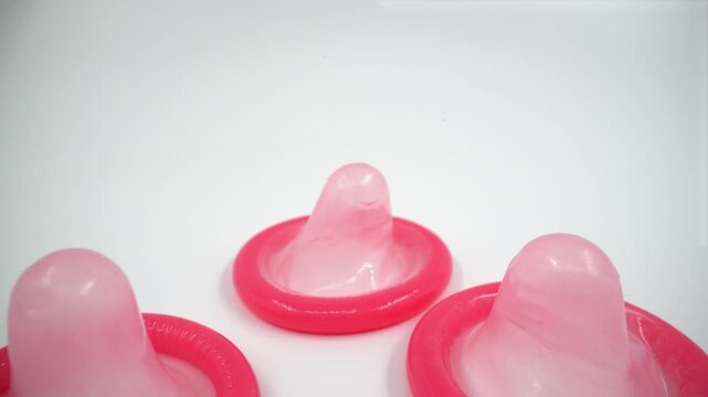 Unused condoms on white background isolated
