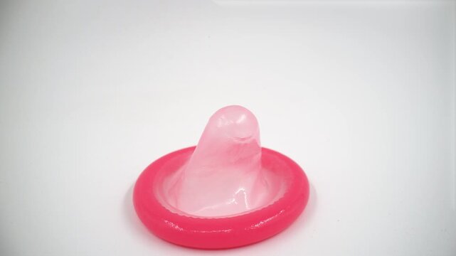 Unused condoms on white background isolated