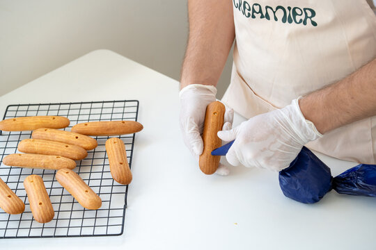Baking Eclairs in a Kitchen With Detailed Pastry Preparation