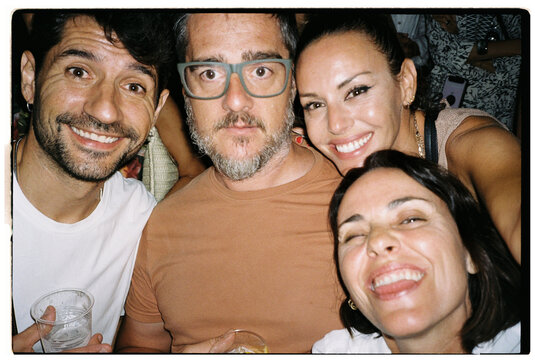 Group of Friends Smiling at Music Festival