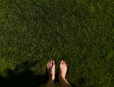 feet on the grass