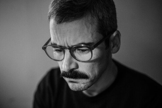 Focused Man in Thoughtful Silence

