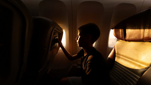 Kid In Airplane