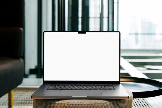 Mockup Blank Laptop Screen in Modern Office