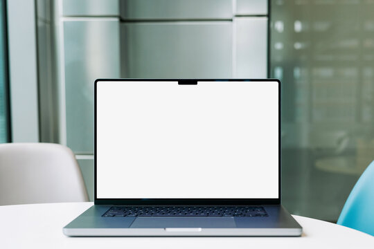 Laptop Mockup with White Blank Screen on Office Table