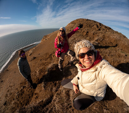 Selfie Of Hiking at the Coastline With Friends on a Sunny Day in Fall