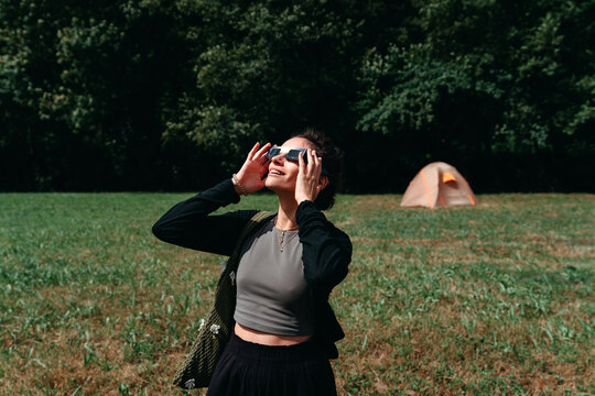 Watching the sun with solar eclipse sunglasses