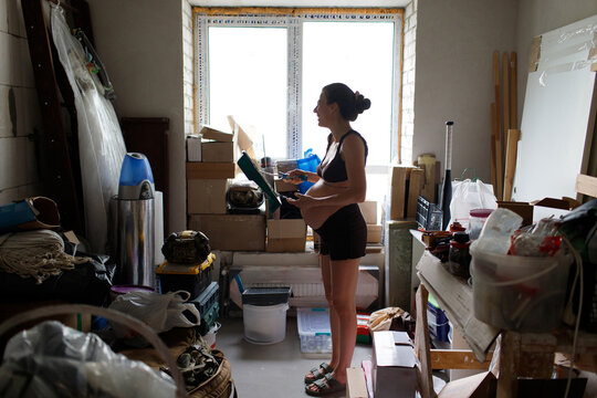 pregnant woman in a room during renovation