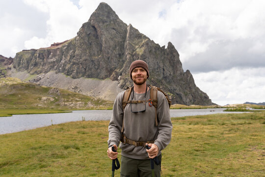 Man hiking in mountain valley