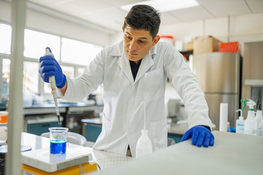 Pipetting blue solution


