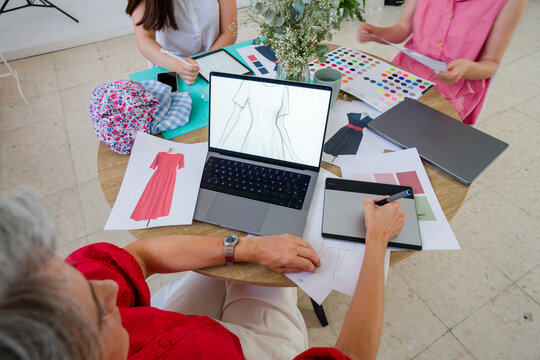 Fashion designers working on new dress collection