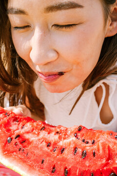 Enjoying fresh watermelon on a sunny day