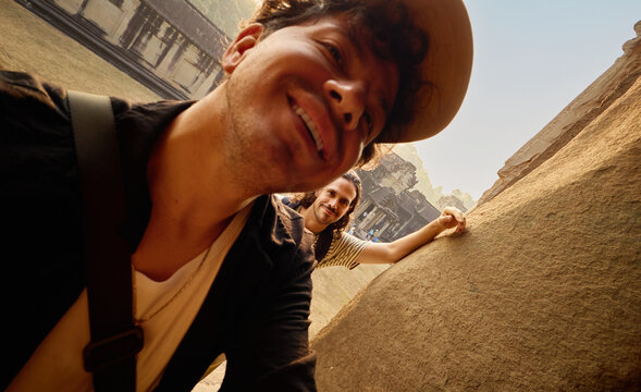Close-up selfie with temple background