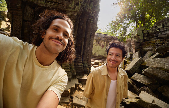 Friends taking selfie at temple ruins