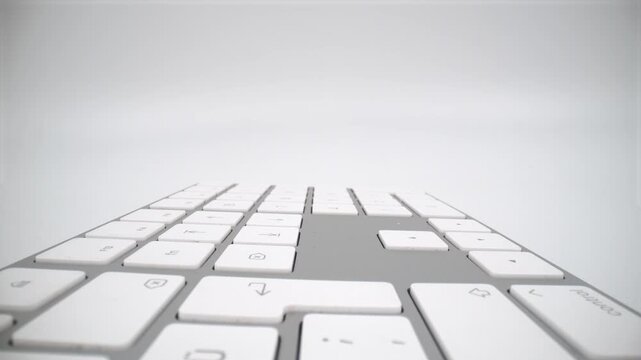 Macro of keys of wireless keyboard on white background isolated