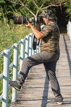 Photographer in action at the wetlands